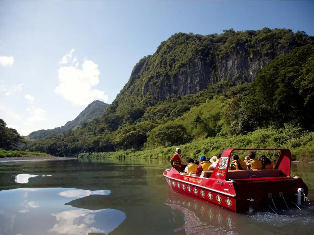 A boat tour in the Sigatoka river for vacationers in Fiji.