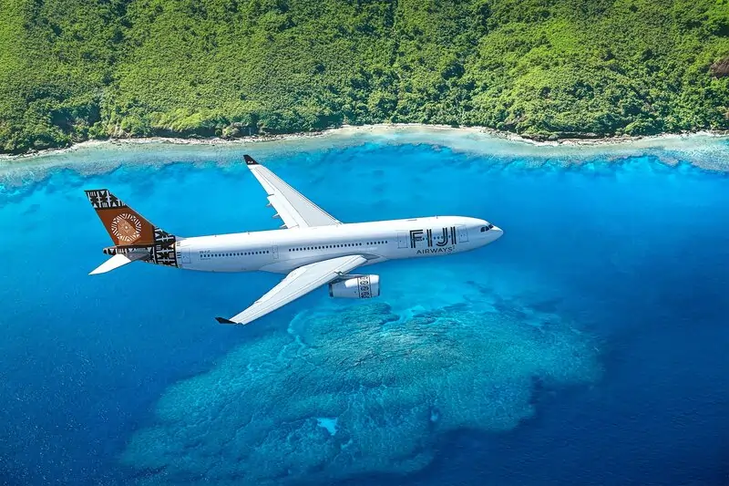 Fiji-Airways-flying-over-an-island
